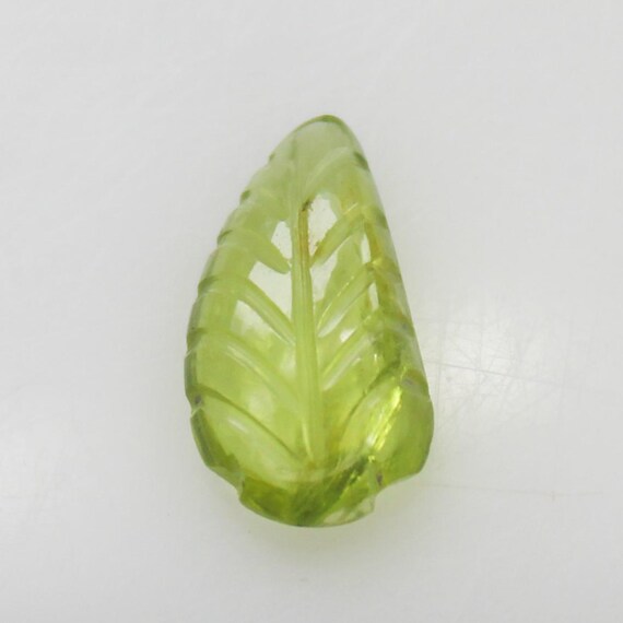 Natural Green Peridot Carving: 1.45 Carat Fancy-Shape Gemstone 10x5x3 mm Size
