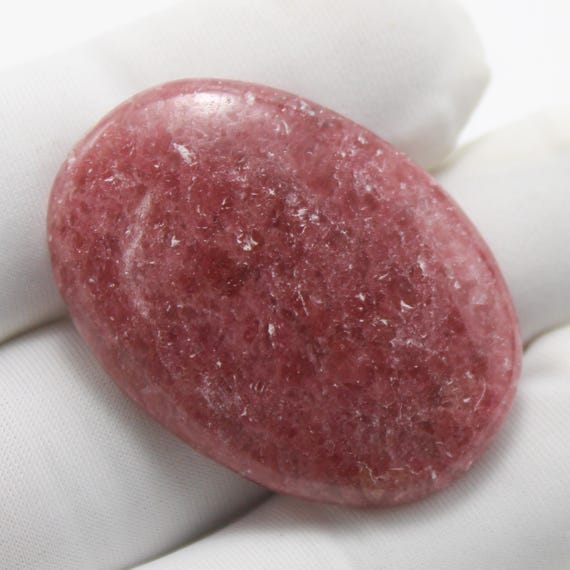 Natural Rhodonite Cabochon: AAA+ Oval Gemstone, 62.40 Carat 36x26x6 mm Size