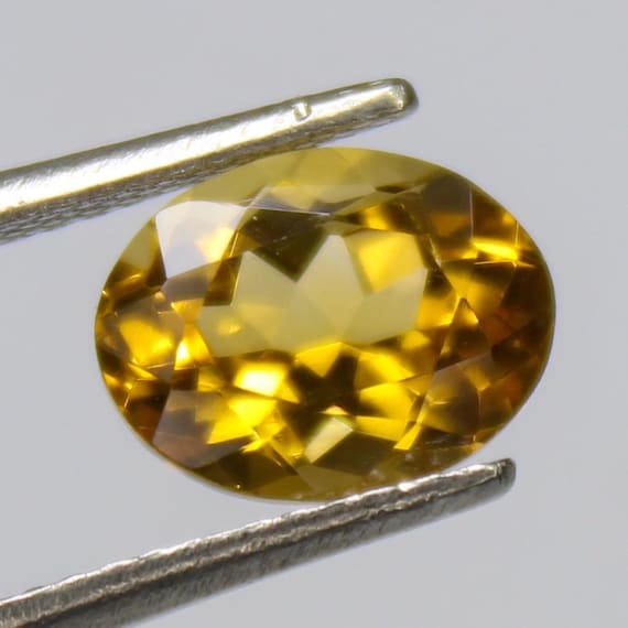 Faceted Oval Citrine Gemstone: Natural Yellow Jewelry Making Stone, 9x7x5 mm, 2.00 Carat