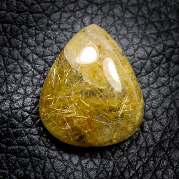 Golden Rutile Quartz Cabochon: Natural Pear-Shaped Gemstone (20x17x6 MM)