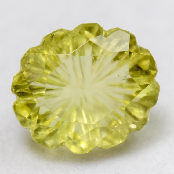 Natural Faceted Lemon Quartz Carving Gemstone: 19.90 Carat ( 18x15x4 mm Size )