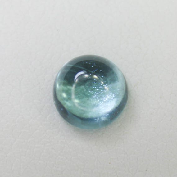 Natural Blue Apatite Cabochon: 1.55 Carat In Round Shape Gemstone, 7x7x4 mm
