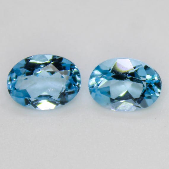 Natural Sky Blue Topaz Cut Pair : Oval Faceted Gemstones, 2.60 Carats (8x6x3 mm)