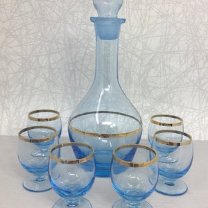Vintage liqueur carafe with glasses