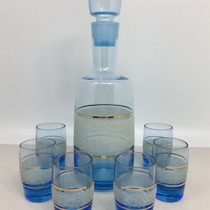 Vintage liqueur carafe with glasses