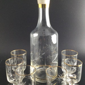 Vintage liqueur carafe with glasses