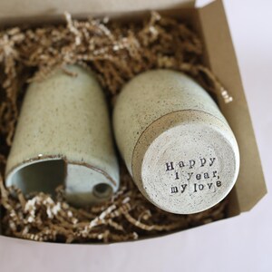 This Handmade Ceramic Travel Tumbler Gift for Coffee Lover is carefully crafted from pottery with a comfortable grip and travel lid, making it a Handmade Pottery Gift Idea for Her, a Wedding Coffee Mug Gift for Fiancé, and a perfect College companion.