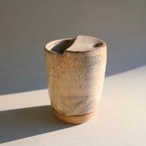 This Handmade Ceramic Travel Mug Gift for Coffee Lover is crafted from durable pottery with a beautiful artisan glaze and reusable travel lid. It makes a thoughtful Handmade Pottery Gift Idea for Her, whether you're celebrating a birthday, holiday, or special occasion. This Wedding Coffee Cup To Go Gift for Fiancé is also a practical Gift College students can enjoy every day for coffee, tea, or hot chocolate.