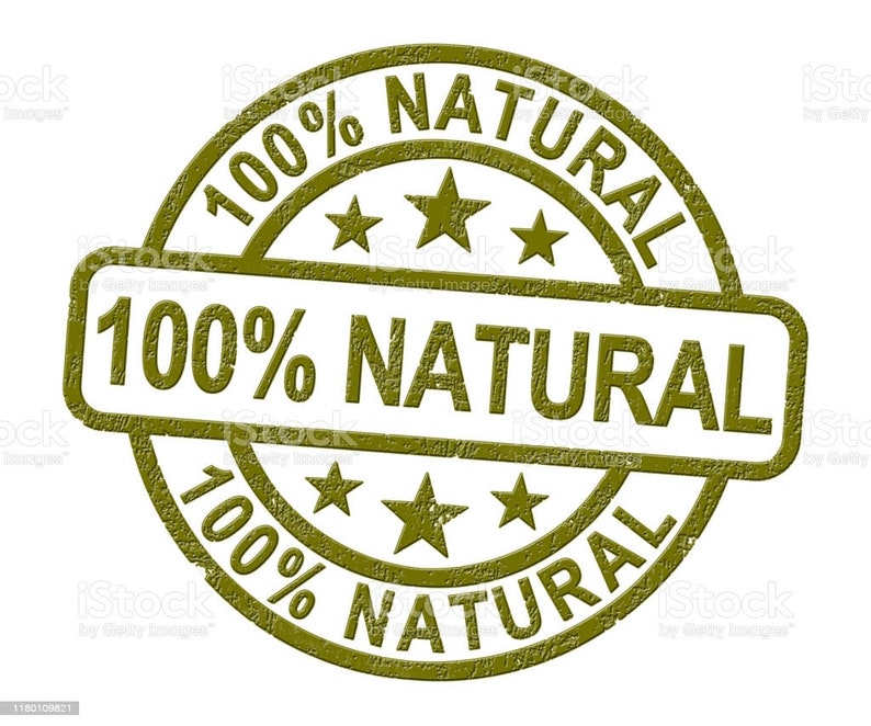May include: A green rubber stamp with the text "100% NATURAL" in a circle and a rectangle. The stamp has a distressed, worn look.