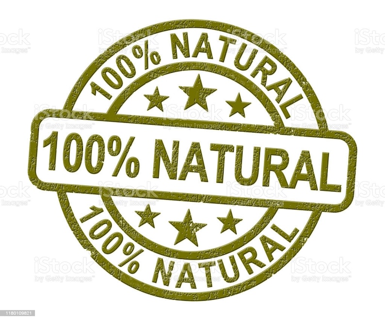 May include: A green rubber stamp with the text "100% NATURAL" in a circle and a rectangle. The stamp has a distressed, worn look.