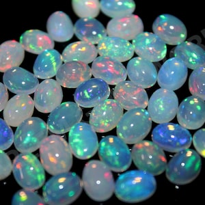 Cabujón de ópalo etíope 100% natural Nowwing, lote de piedras preciosas de forma ovalada, tamaño 6x4 MM, piedra natal de octubre, cabujón, cabujón de tamaño calibrado,