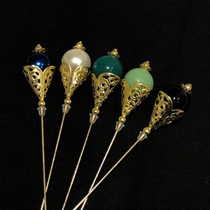 Gold filigree hat pins in a choice of colours: long 15cm
