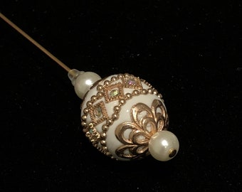 Decorative cream and gold hat pin: 15cm long