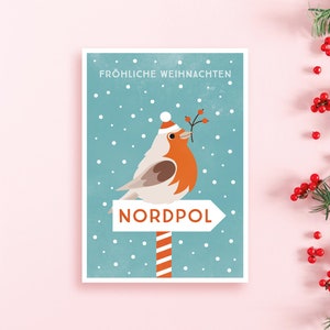 Weihnachtskarte / Nordpol / zauberhafte Postkarte zu Weihnachten, Vogel und Zweig im Schnabel – für alle Weihnachtsfans, Männer und Frauen