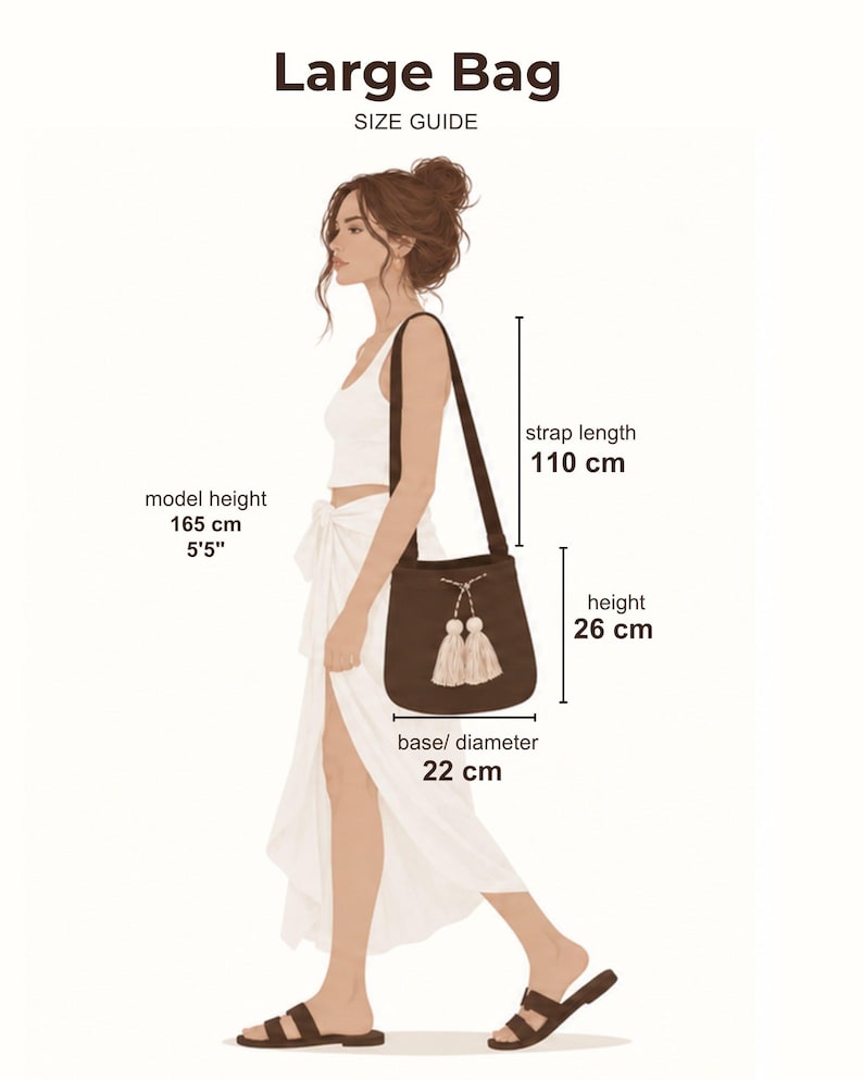 May include: A brown shoulder bag with two cream-colored tassels on the front. The bag has a strap length of 110 cm, a height of 26 cm, and a base diameter of 22 cm. The text Large Bag SIZE GUIDE is at the top, with model height listed as 165 cm or 5'5".