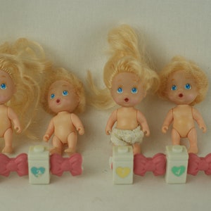 Quints Drink and Wet blonde dolls and accessories Tyco 90s