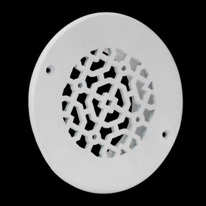 May include: White round plastic vent cover with a decorative, intricate, geometric pattern.