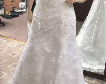 Strapless, hand beaded, lace wedding dress