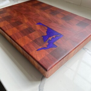 Cutting board with state inlay