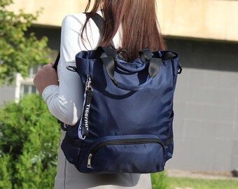 Convertible women's backpack, 3 in 1 waterproof laptop bag.
