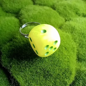opaque yellow dice ring,dnd,dungeons,dragons,dice game,gambling,casino,gambler,die,dice,game pieces,tabletop gaming,roleplaying games,