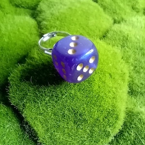iridescent purple dice ring,dnd,dungeons,dragons,dice game,gambling,casino,gambler,die,dice,game pieces,tabletop gaming,roleplaying games,
