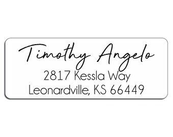 May include: White rectangular return address label with black text. The text reads "Timothy Angelo", "2817 Kessla Way", and "Leonardville, KS 66449".
