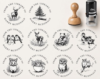 May include: A collection of twelve circular black ink stamps featuring nature-themed illustrations including a deer, pine tree, birds, bear, ducks, fox, and owls. Each stamp includes the text FROM THE LIBRARY OF HARRY MCDONALD. A wooden handle stamp and a black self-inking stamp are shown.