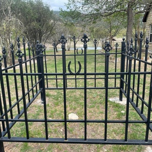 Ornamental Iron memorial Fence with gate.