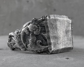 Ruins ring -a wide brutal ring with an with patterns of Khmer architecture