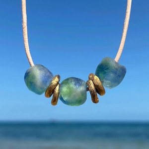 Sea glass necklace, blue green recycled beads and brass rings on leather cord for her. Eco-friendly glass beaded necklace gift for women.