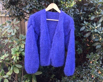Gorgeous hand knitted chunky mohair and alpaca cardigan. Size 8/10. Blue