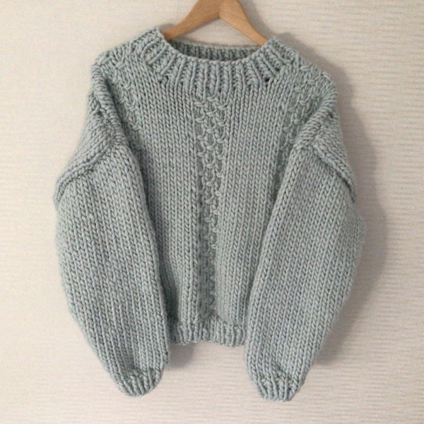 Hand knitted super chunky jumper in ice blue. 12/14