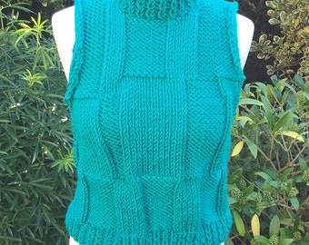 Hand knitted chunky vest top in green. Size8/10.