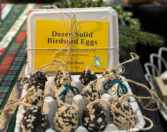 Docena de huevos sólidos de semillas para pájaros