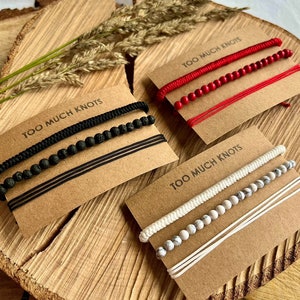 Sets met kralen, touwtje en geluksknooparmbanden, zwart/rood/witte varianten, voor man/vrouw afbeelding 1