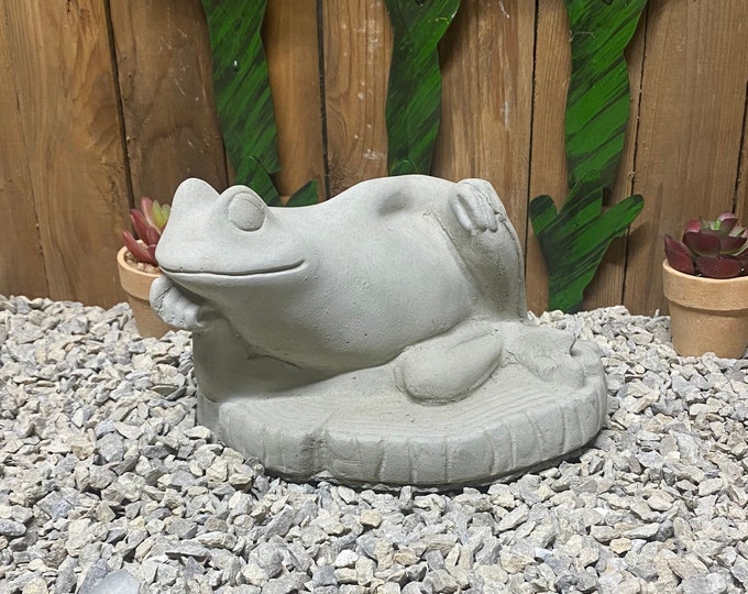 Relaxing frog concrete statue