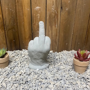 Middle finger concrete statue, flipping off garden statue