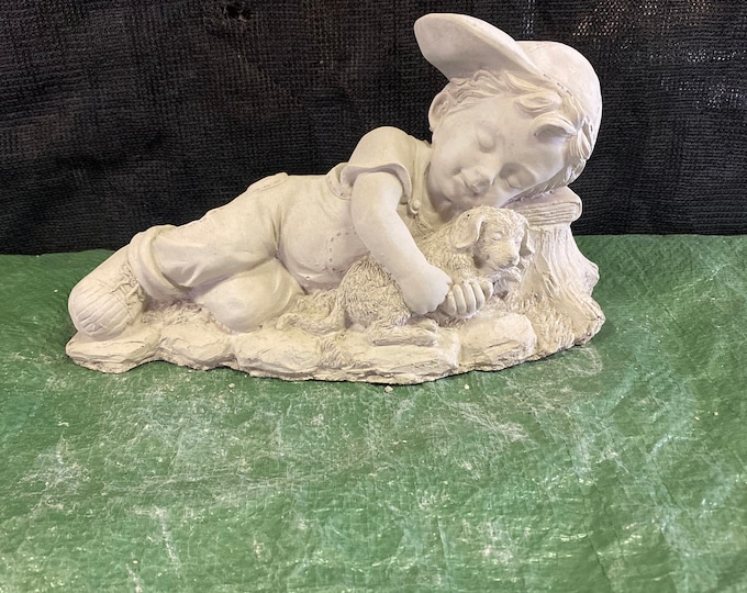 Laying boy with dog concrete statue garden decor
