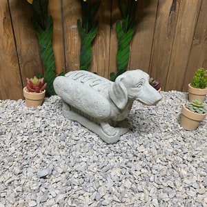 Dachshund/ wiener dog in hotdog bun concrete Statue indoor/ outdoor home decor