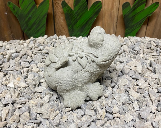 Frog with butterfly concrete statue