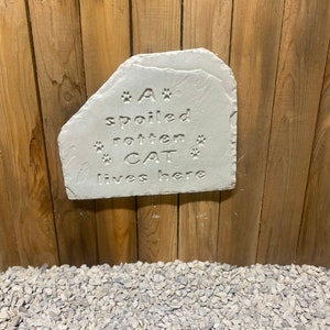 Spoiled cat concrete plaque