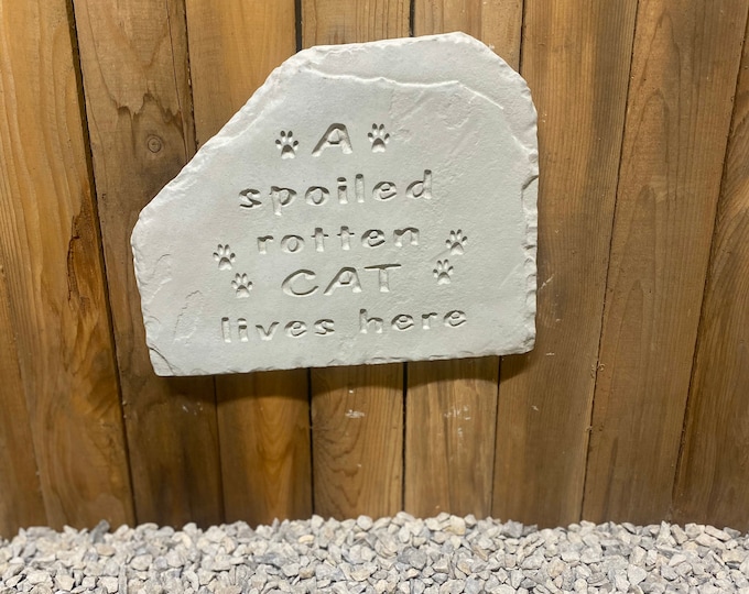 Spoiled cat concrete plaque