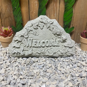 Welcome rock concrete statue