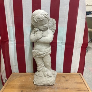 Angel with rabbit concrete statue