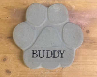 Custom engraved concrete paw print