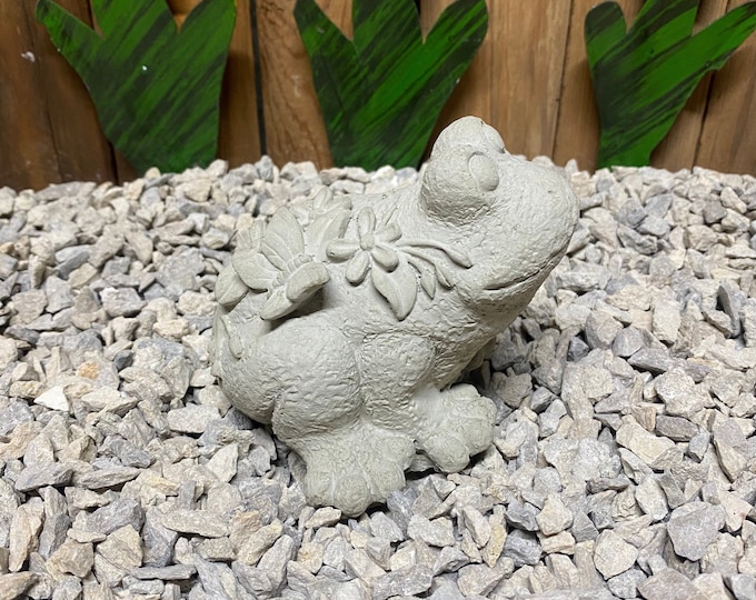 Frog with butterfly concrete statue