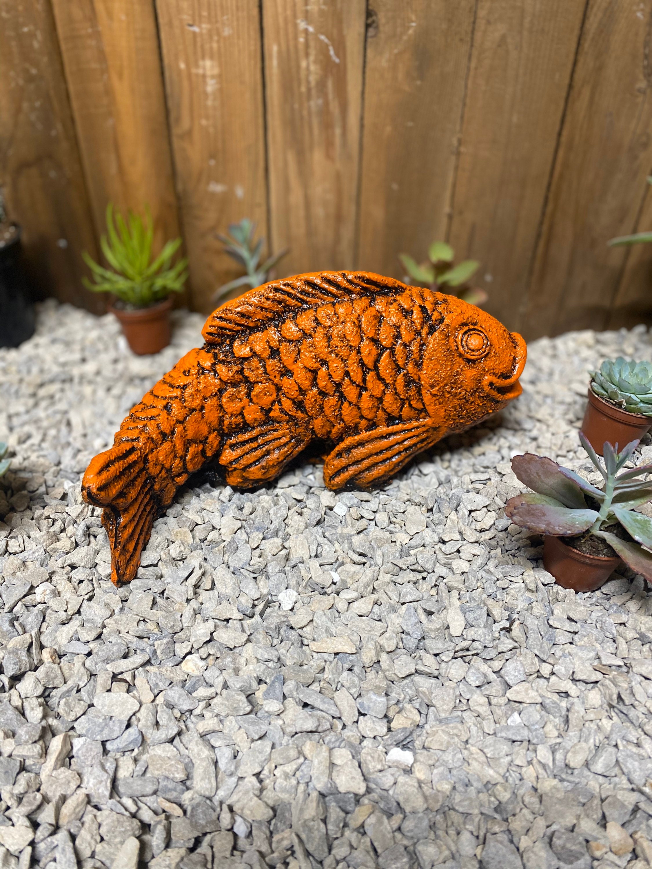 Koi fish concrete statue