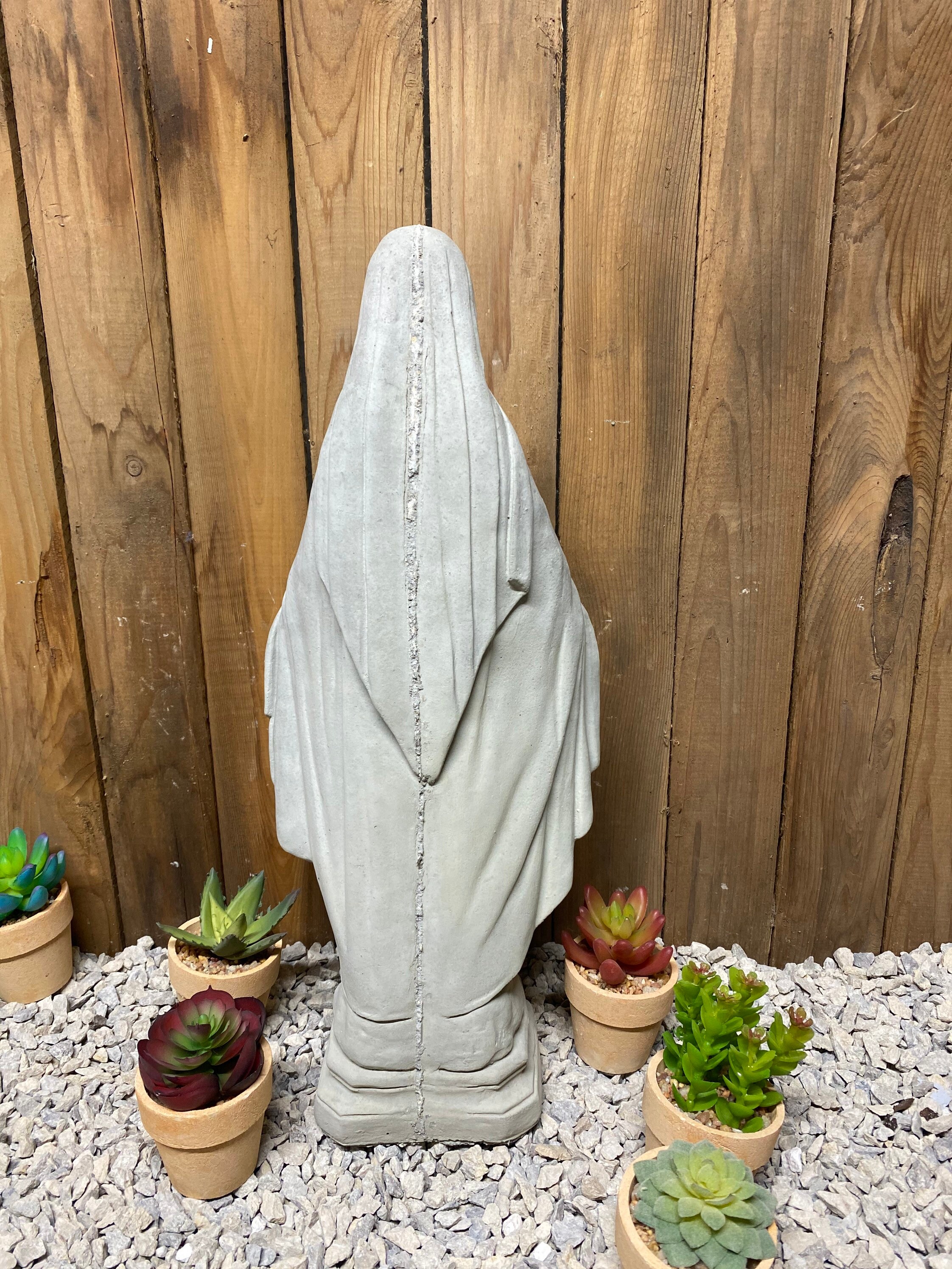 concrete statue of mary