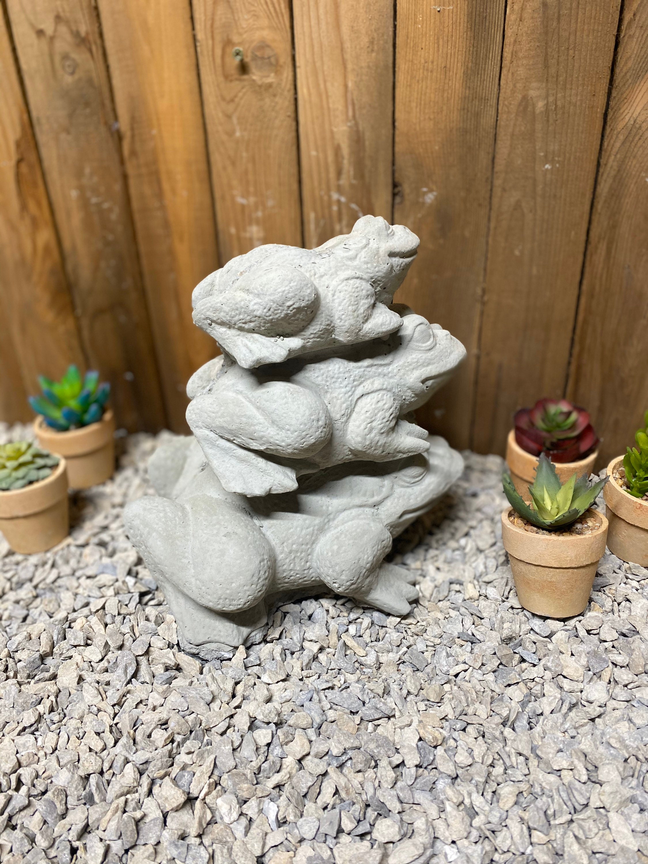 concrete frog statue